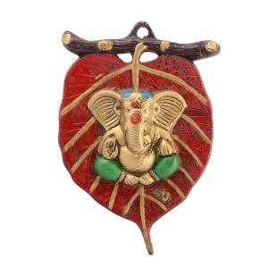 eCraftIndia Lord Ganesha Wall Hanging featuring green dhoti and red leaf design for home décor display