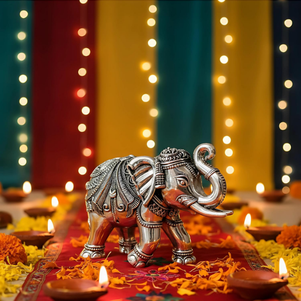 Silver plated elephant idol pair suitable for temple decor, puja spaces and thoughtful gifts