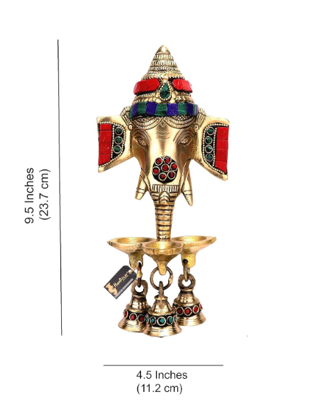 Brass Ganesha Diya wall hanging featuring intricate detailing and three brass bells for pooja décor