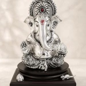 Silver-plated Ganesha Idol for Home with Modak, Mushak and detailed traditional ornamentation