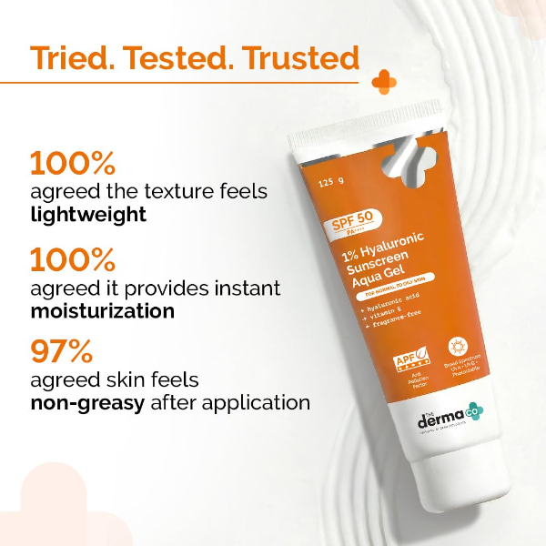The Derma Co SPF 50 sunscreen tube featuring hyaluronic acid and vitamin E hydration benefits