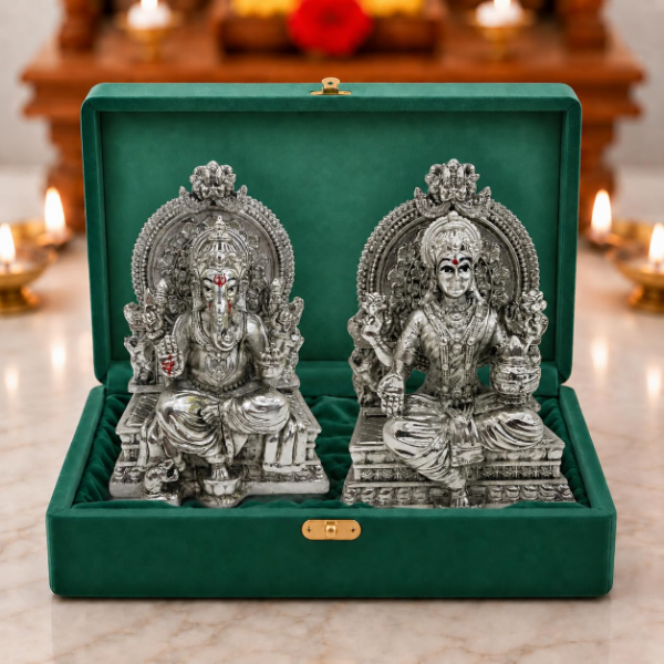 Silver-plated Lakshmi Ganesh Idol with fine detailing and attached base for home temple display