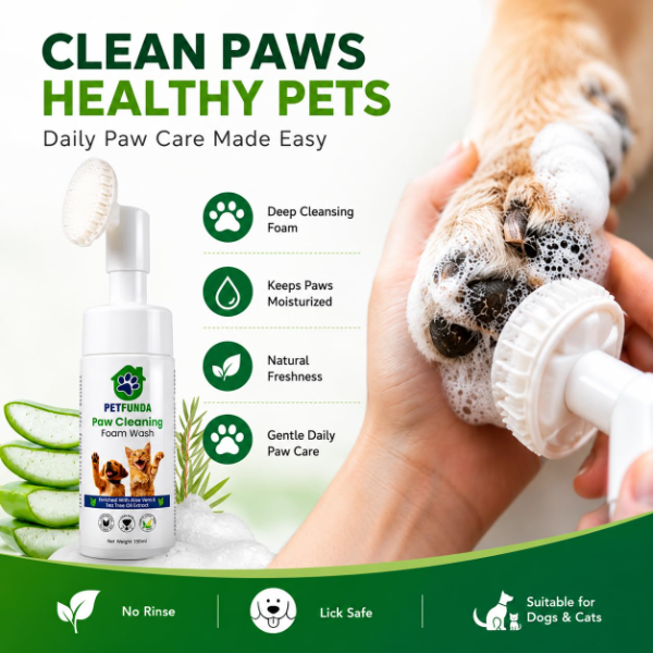 Paw cleaning foam brush applying rich cleansing foam to a pet paw with soft silicone massage bristles