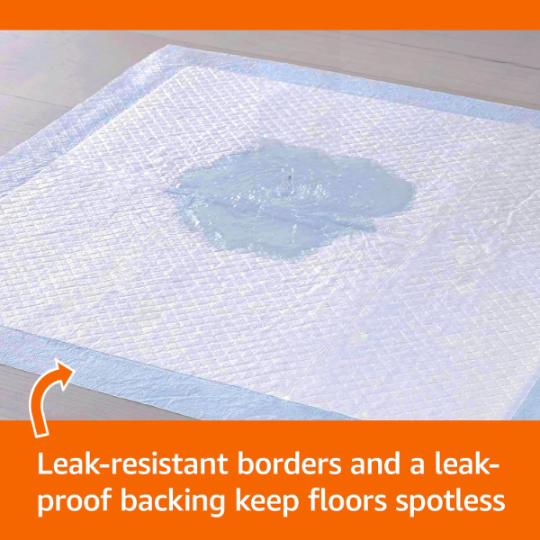 Pet Pee Pads displaying absorbent core and waterproof border for indoor puppy and small dog toilet training