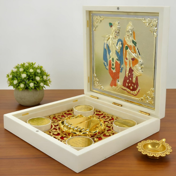 Radha Krishna puja box with red velvet lining and four circular containers for spiritual essentials