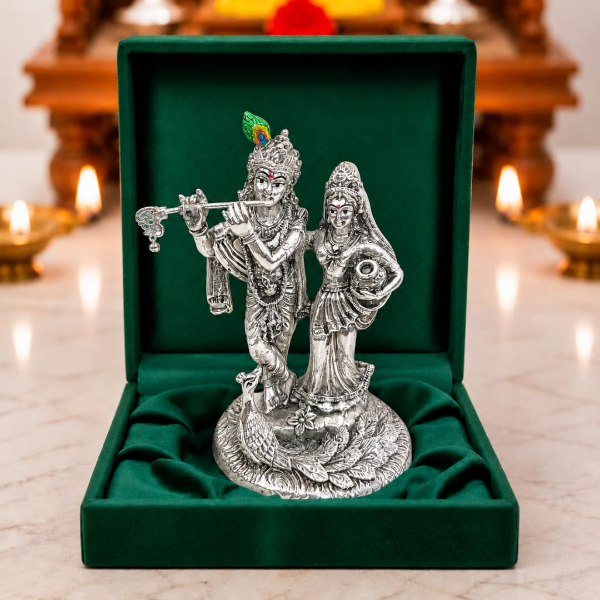 Silver Radha Krishna idol with peacock and 999 plated finish for pooja room home décor display