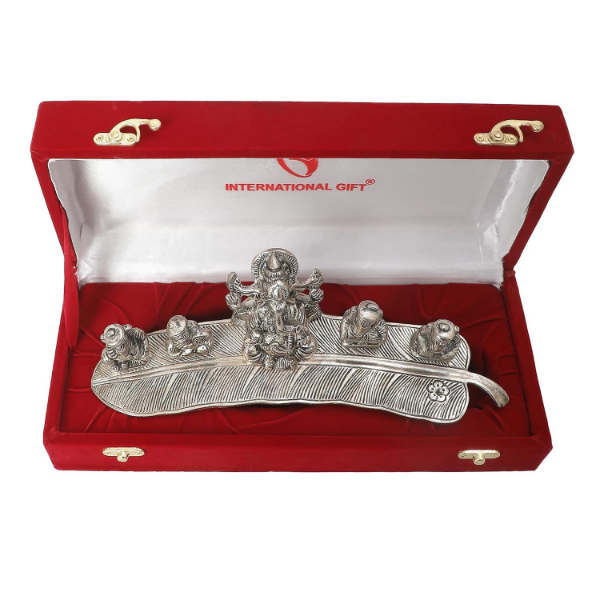 Silver plated Ganesha idols with five musical figures on leaf bases for gifting and display